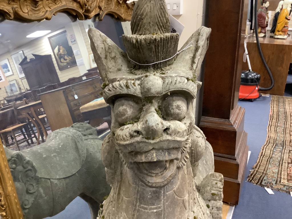 A faux carved marble temple dog, width 86cm, height 110cm